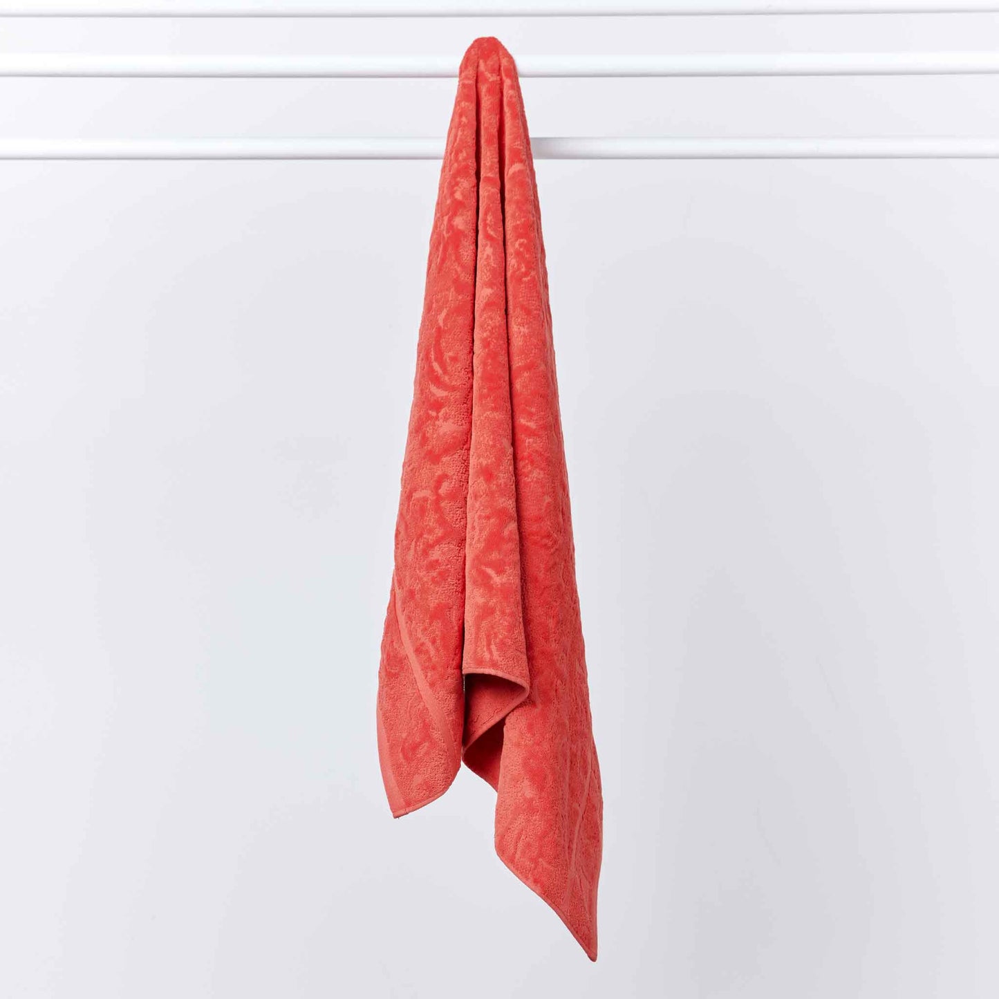 Shadows towel in Coral